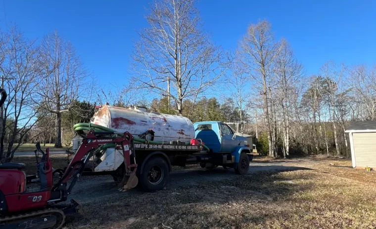 A Brown Trout Septic truck is parked
